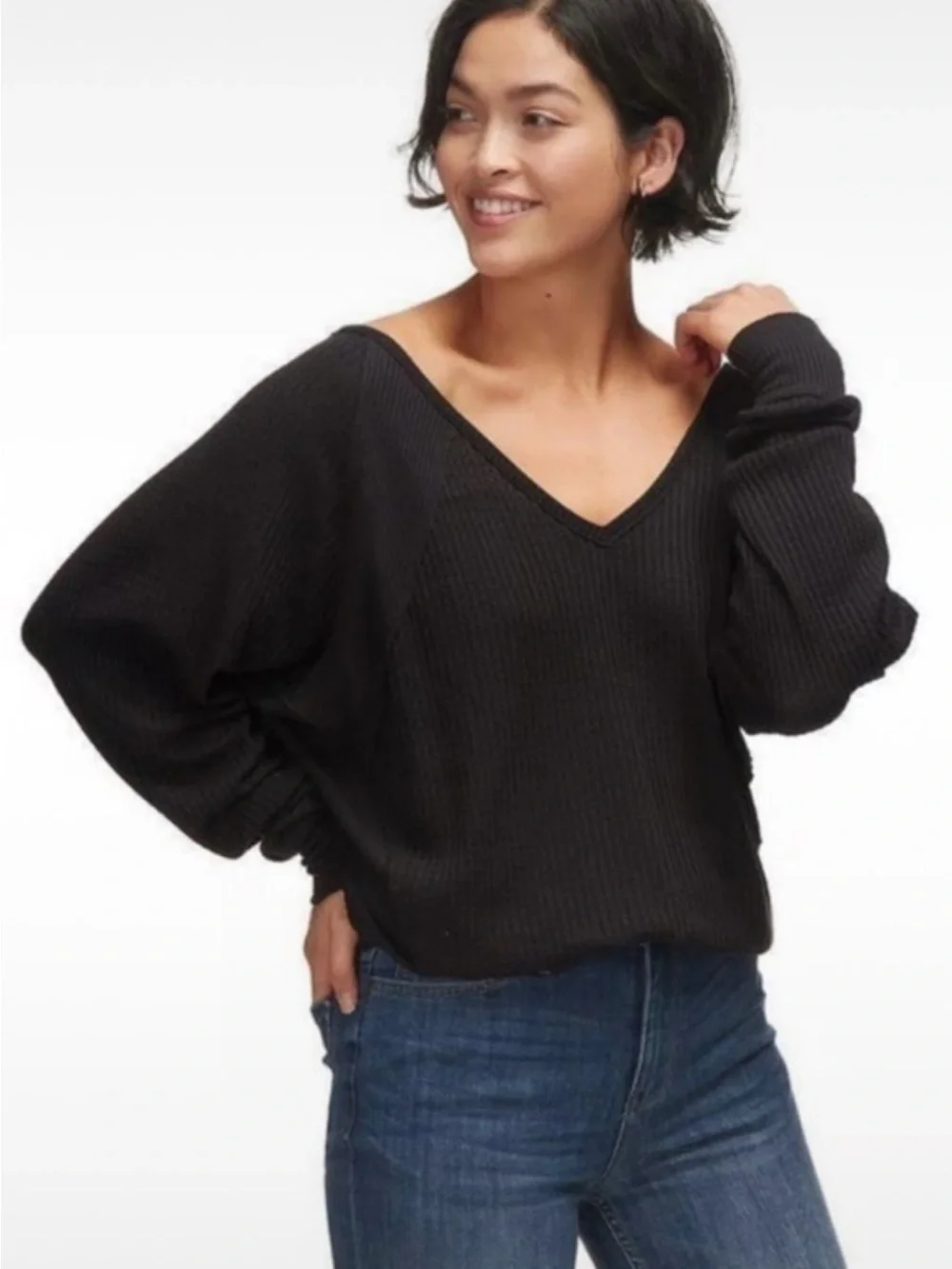 Free People size XS (can fit up to XL)  V-Neck Black Ribbed Women's Sweater